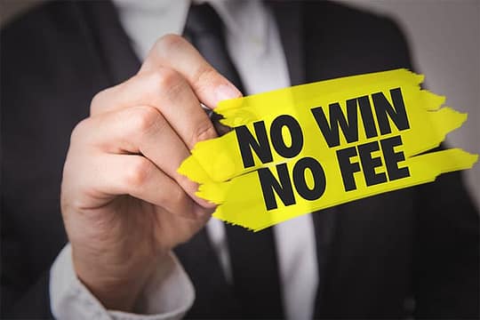 Man writing "NO WIN NO FEE" - Product Liability lawyer in Dallas, Texas